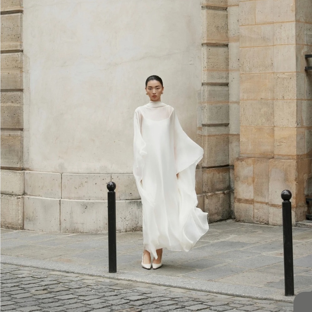 Elegant White Flowing Maxi Dress